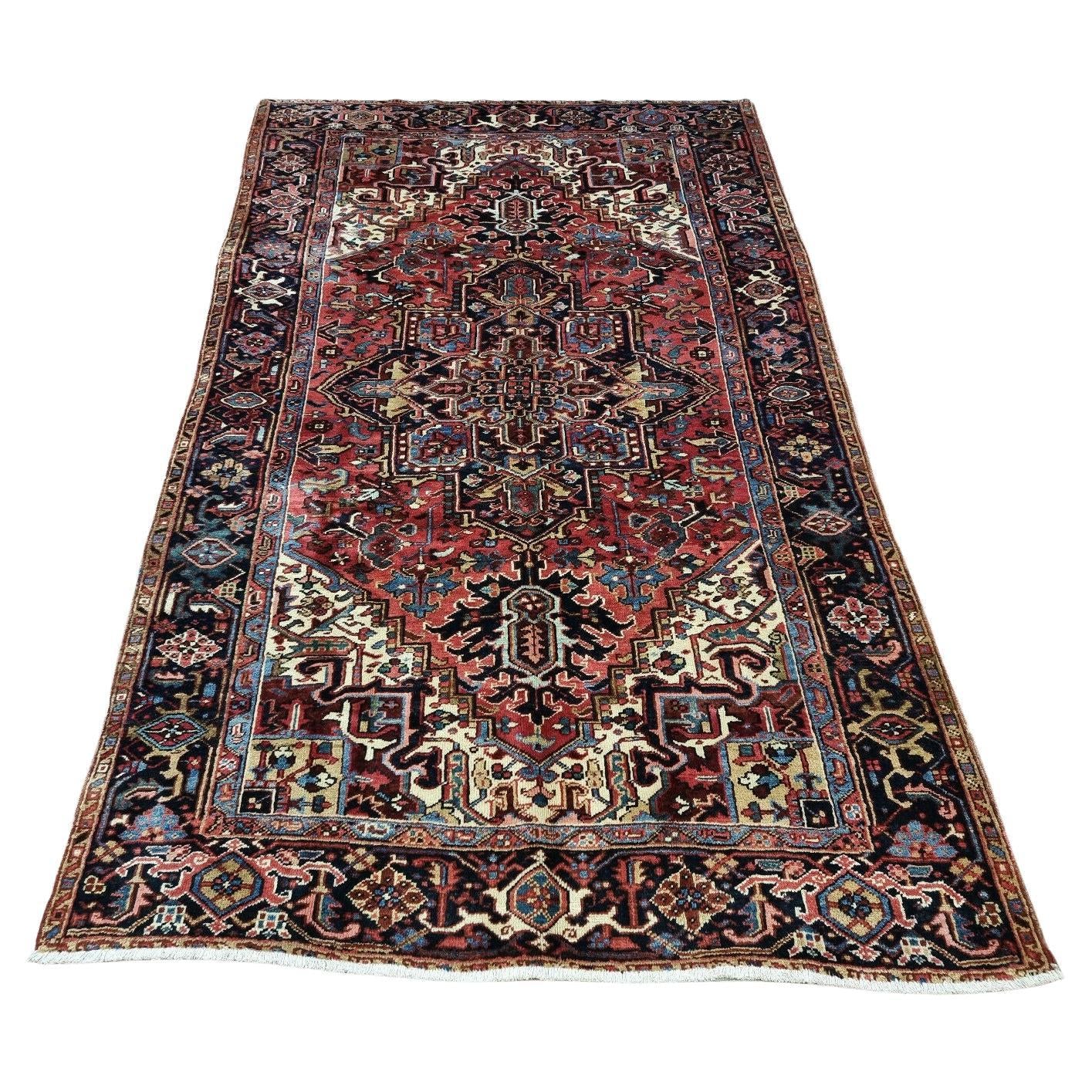 Antique Persian Heriz carpet with geometric design