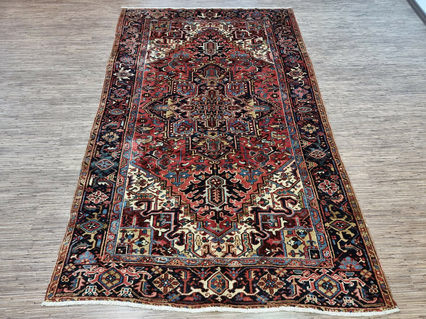 Heriz Persian carpet tribal design