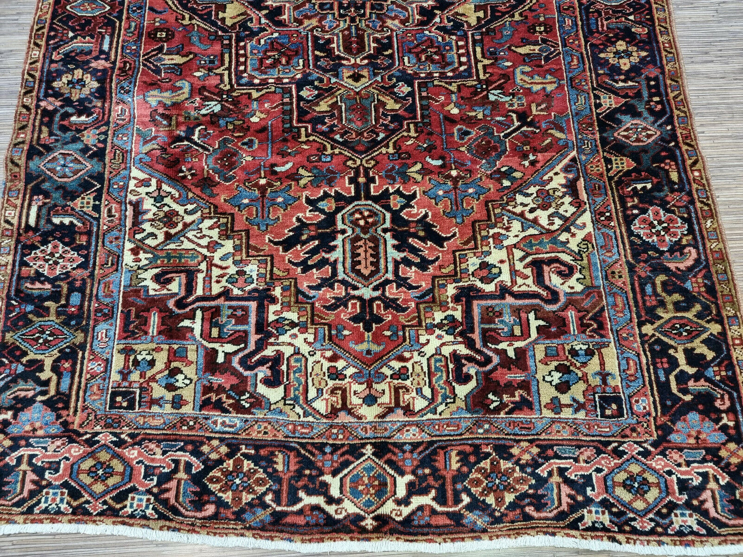 Geometric central medallion on Persian Heriz rug