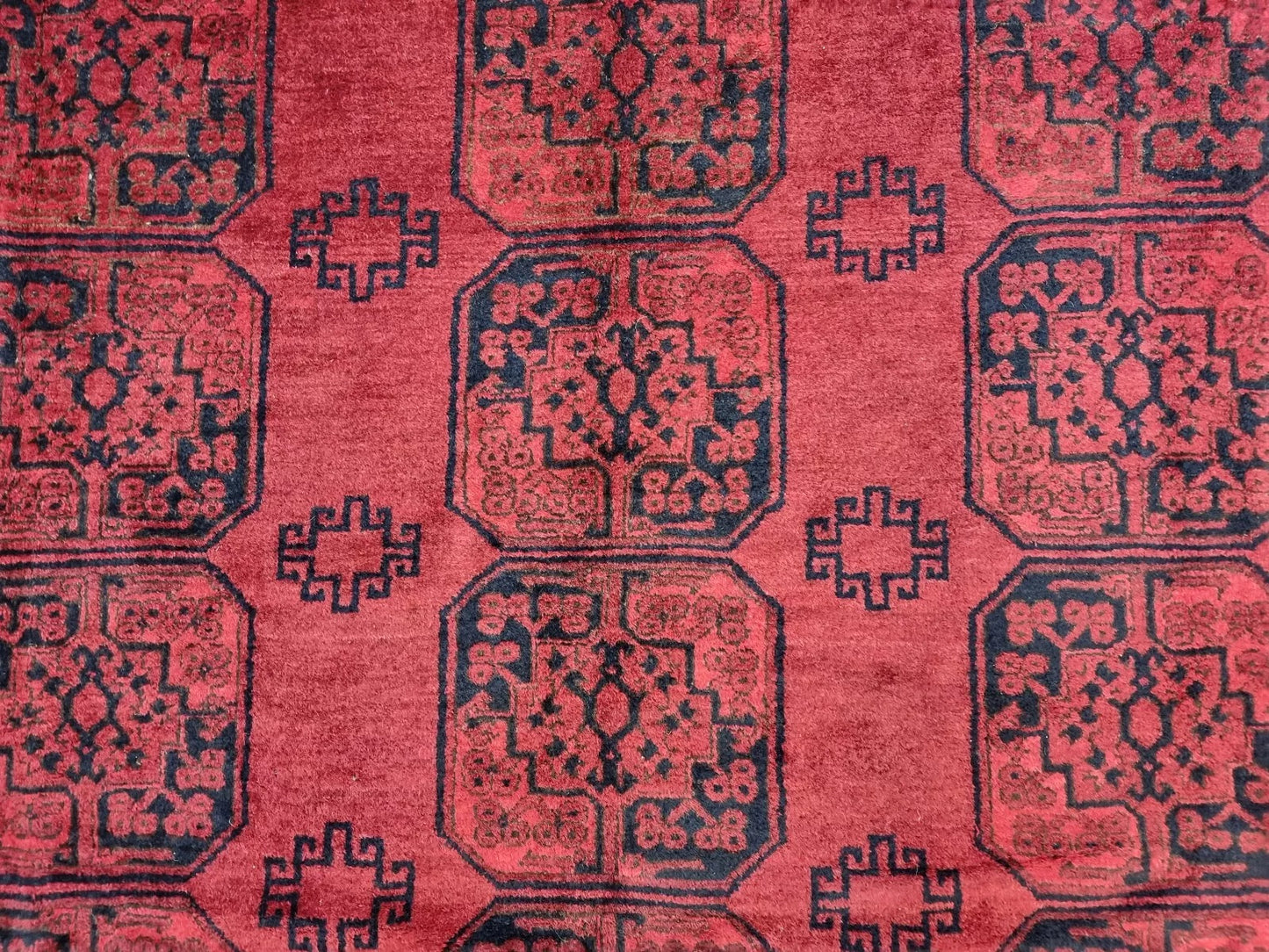 Professionally cleaned Afghan carpet with rich patterns