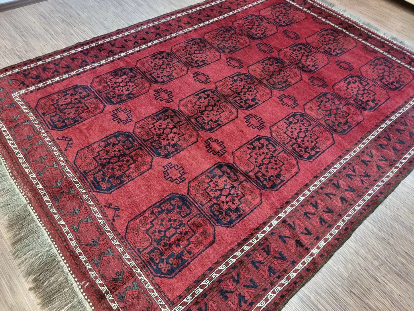 Afghan wool carpet from the 1960s in red