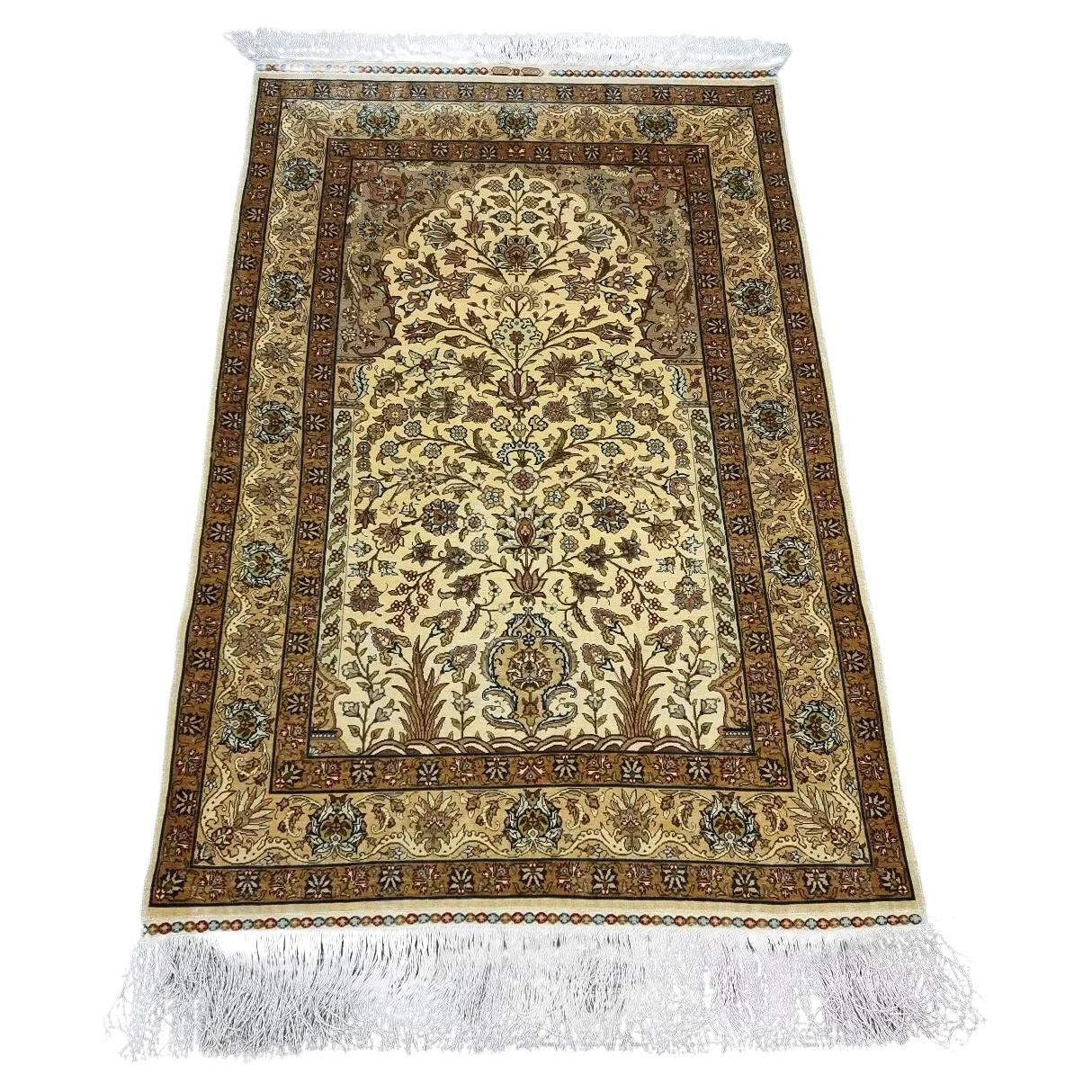 Turkish Hereke silk prayer rug with golden hues and floral motifs