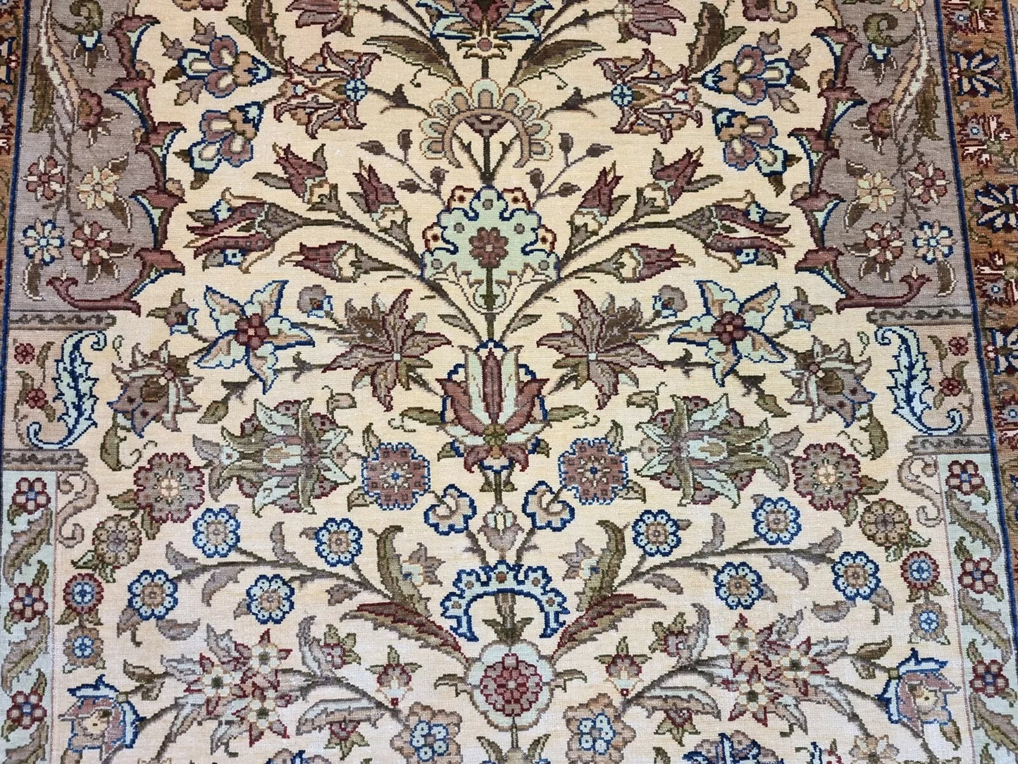 Pure silk Hereke rug with a shimmering golden surface