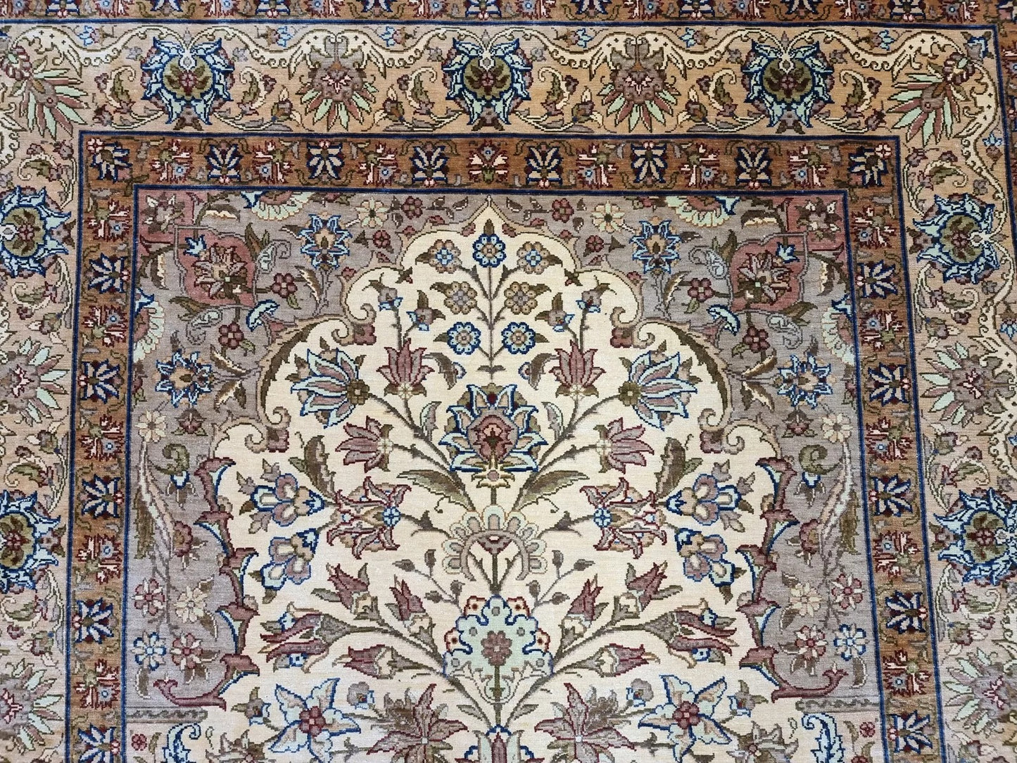 Hand-knotted Hereke prayer rug with fine knot density