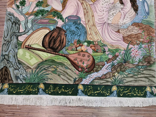 Close-up of figures depicted on a Persian Tabriz silk rug.