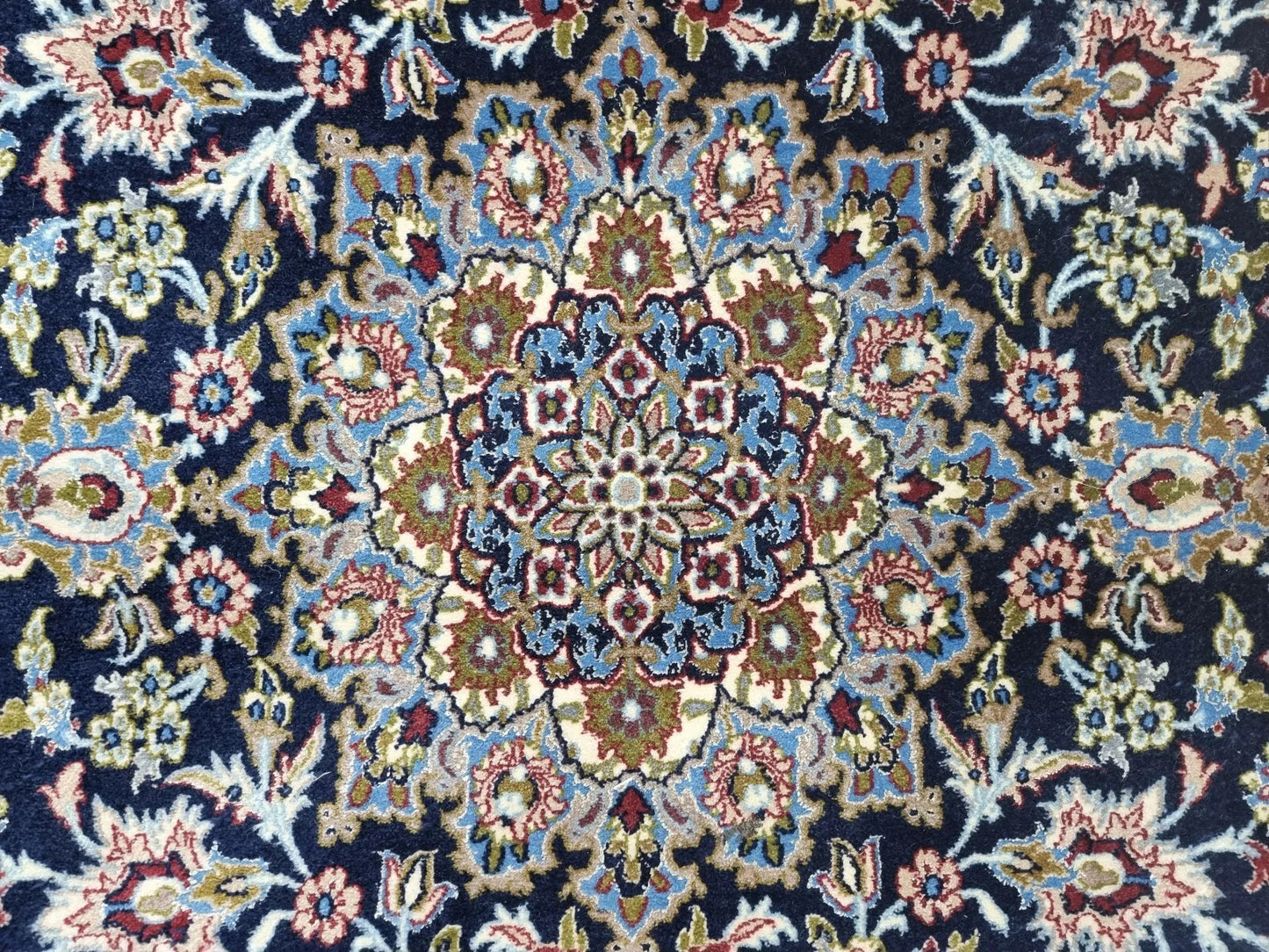 Handwoven Persian rug placed in a modern living room setting