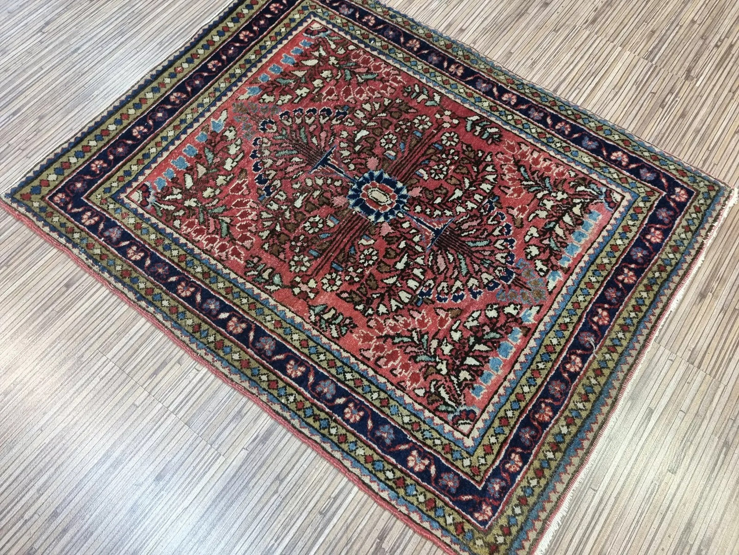 Luxurious wool texture of a handmade early 20th-century rug