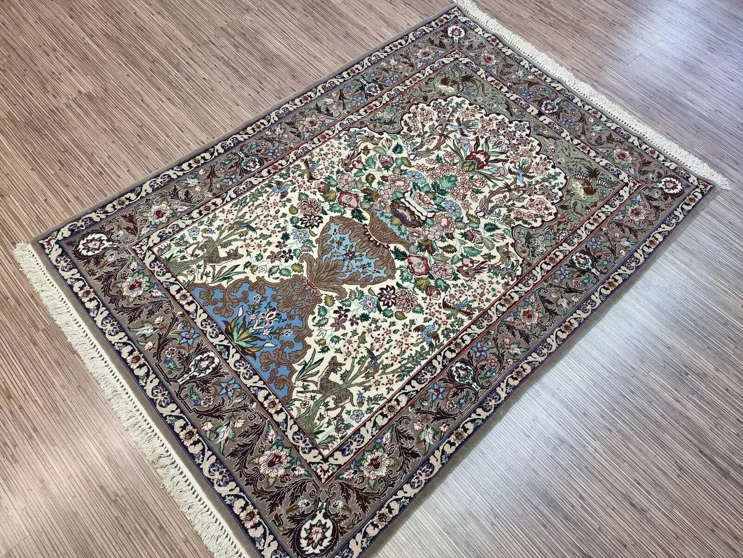 Traditional Persian Isfahan rug with silk foundation and detailed knots