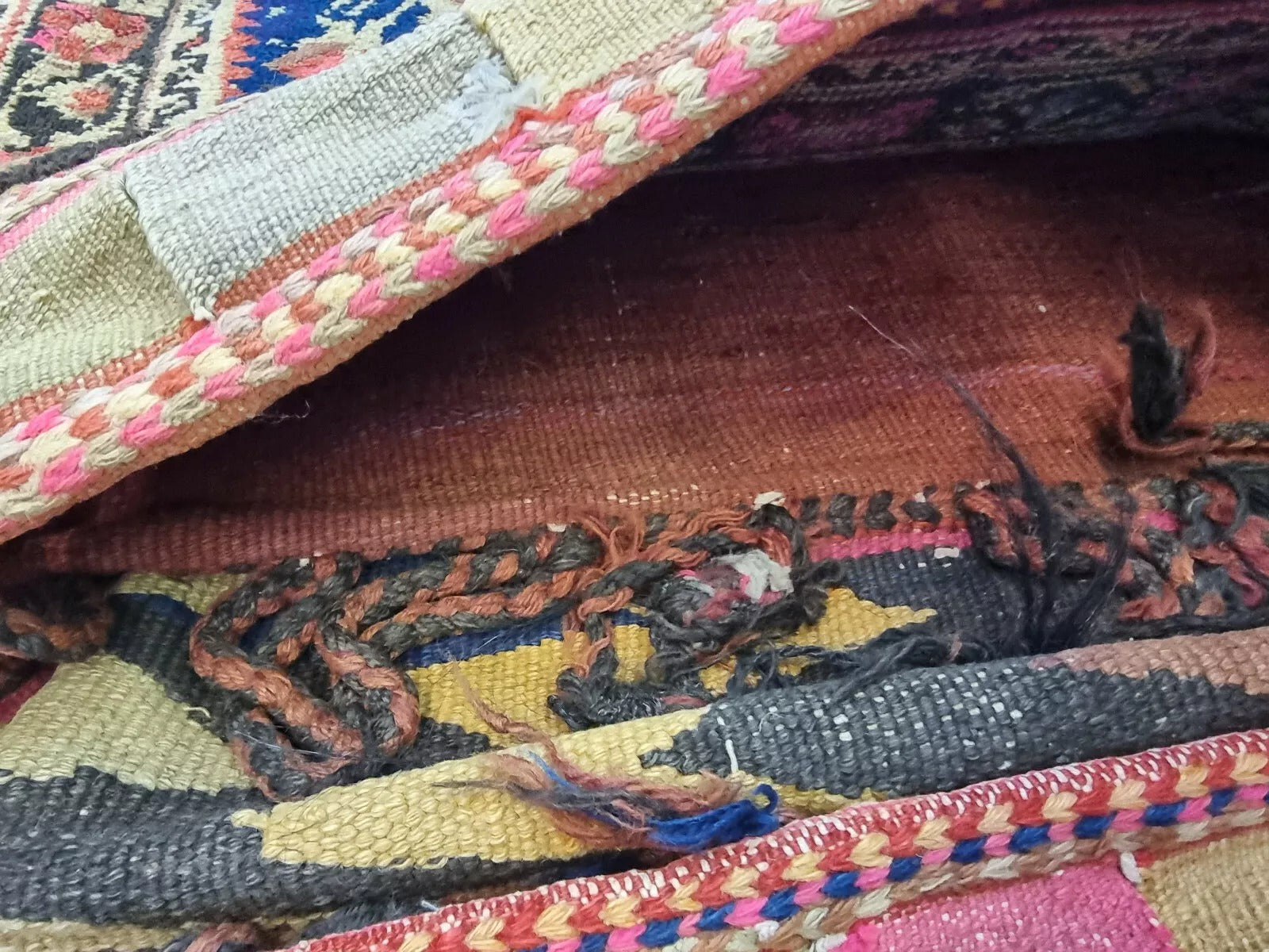 Detailed shot of hand-knotted wool texture on cotton foundation