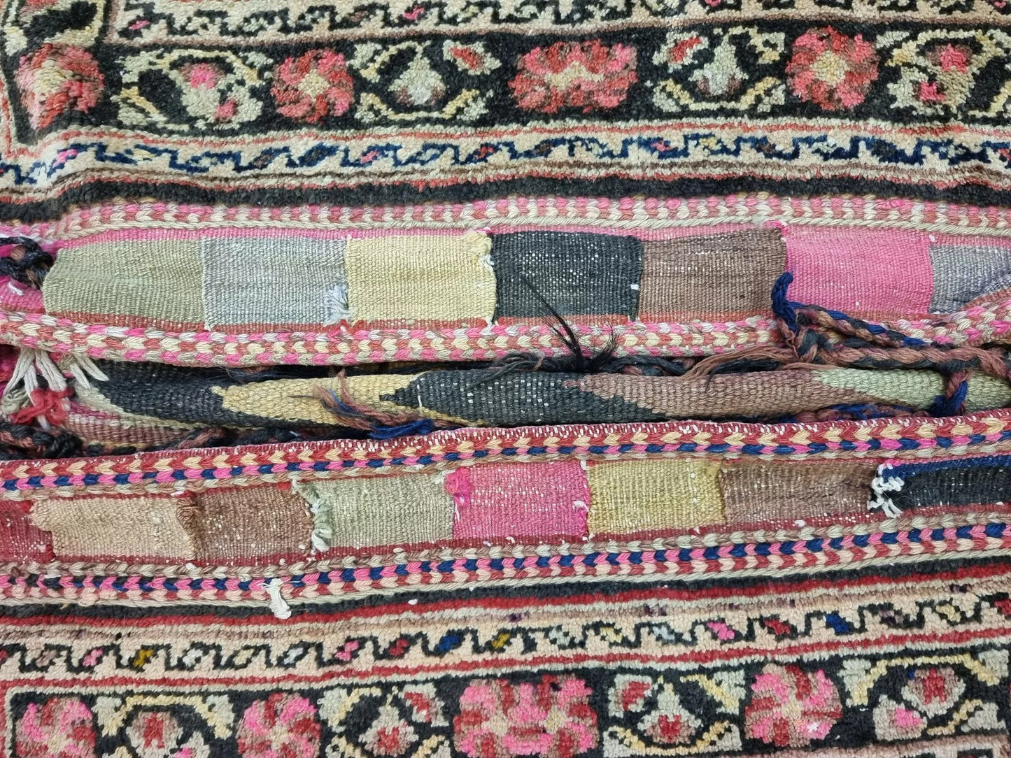 Side view showing the saddle bag’s thickness and intricate patterns