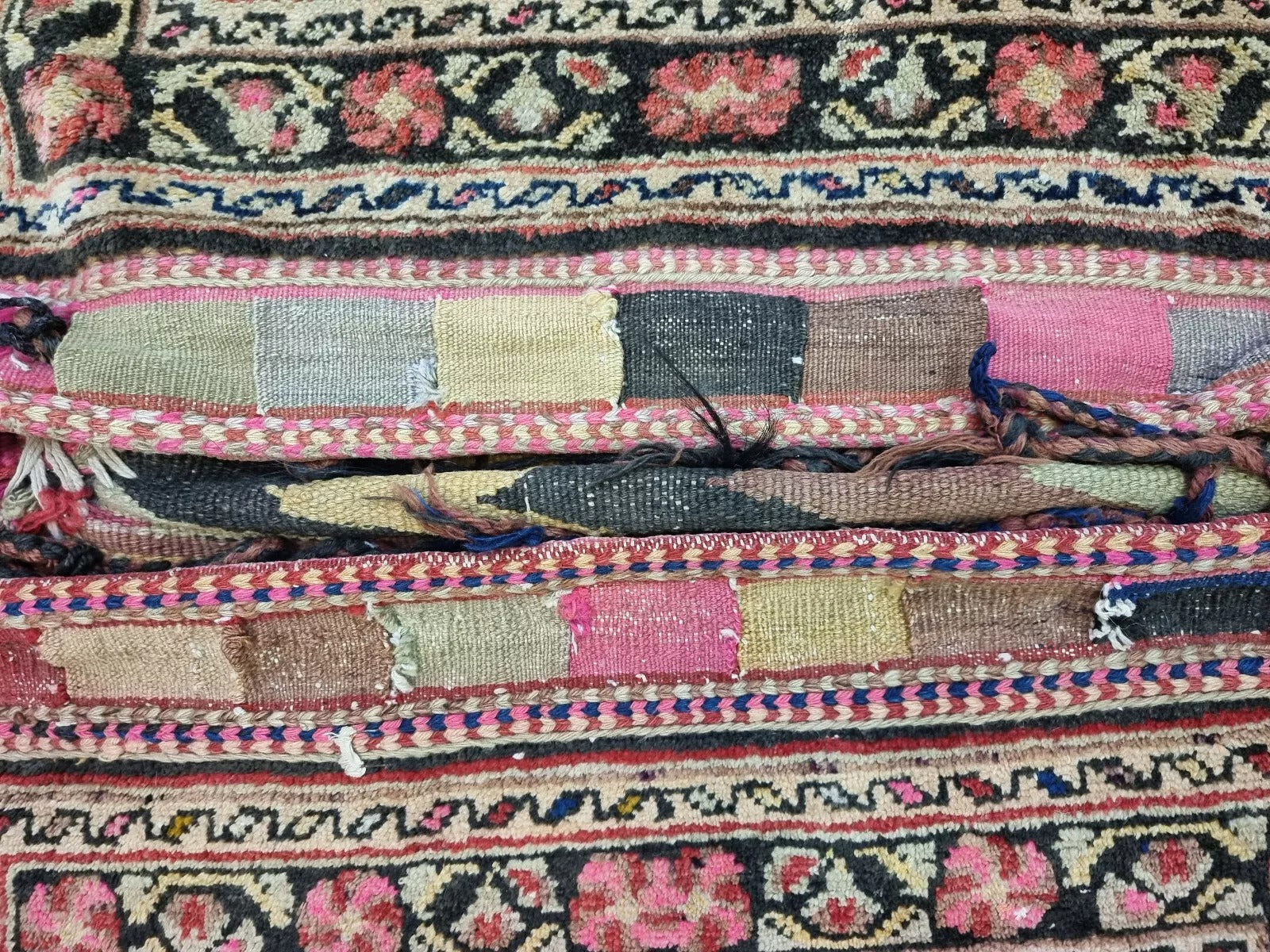 Side view showing the saddle bag’s thickness and intricate patterns