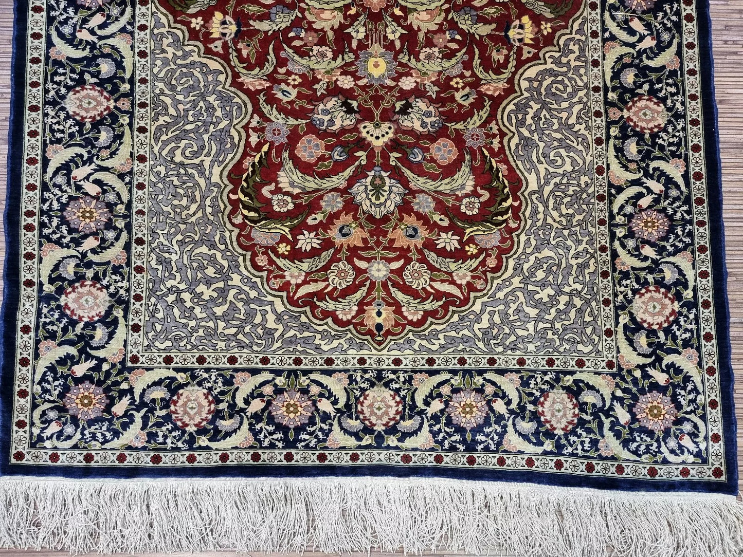 Hand-knotted silk Hereke area rug