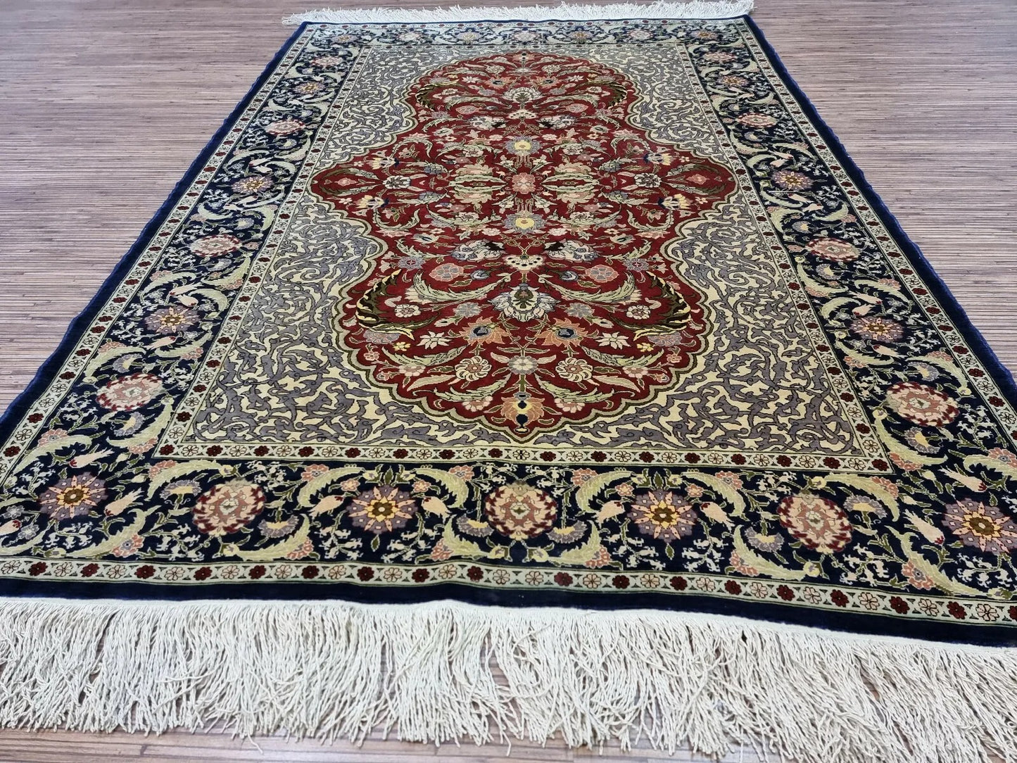 Vintage Hereke rug vibrant red tones