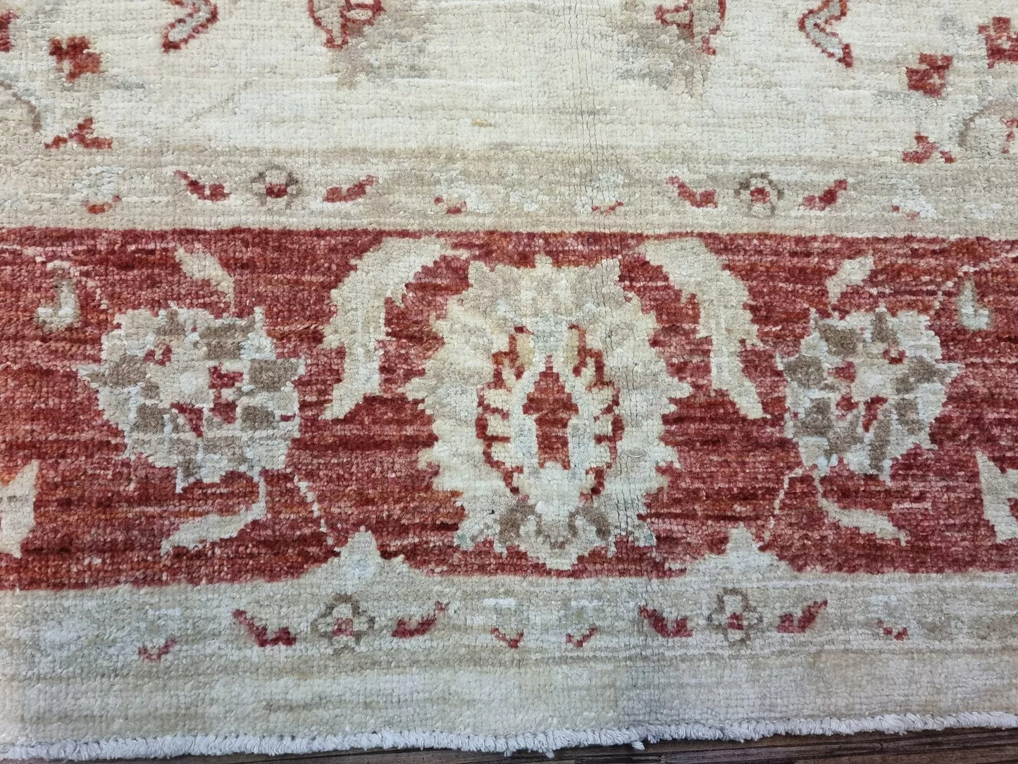 Traditional Afghan Ziegler rug in soft beige tones