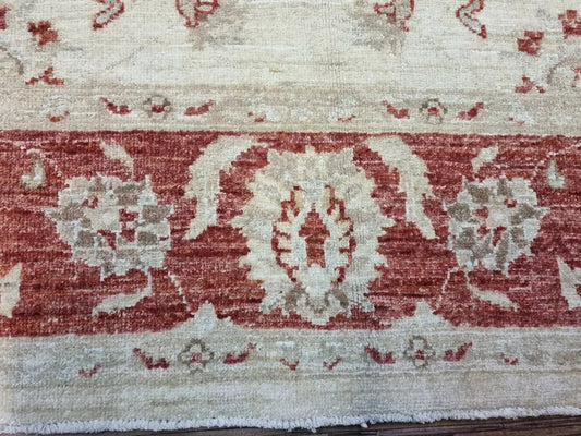 Traditional Afghan Ziegler rug in soft beige tones