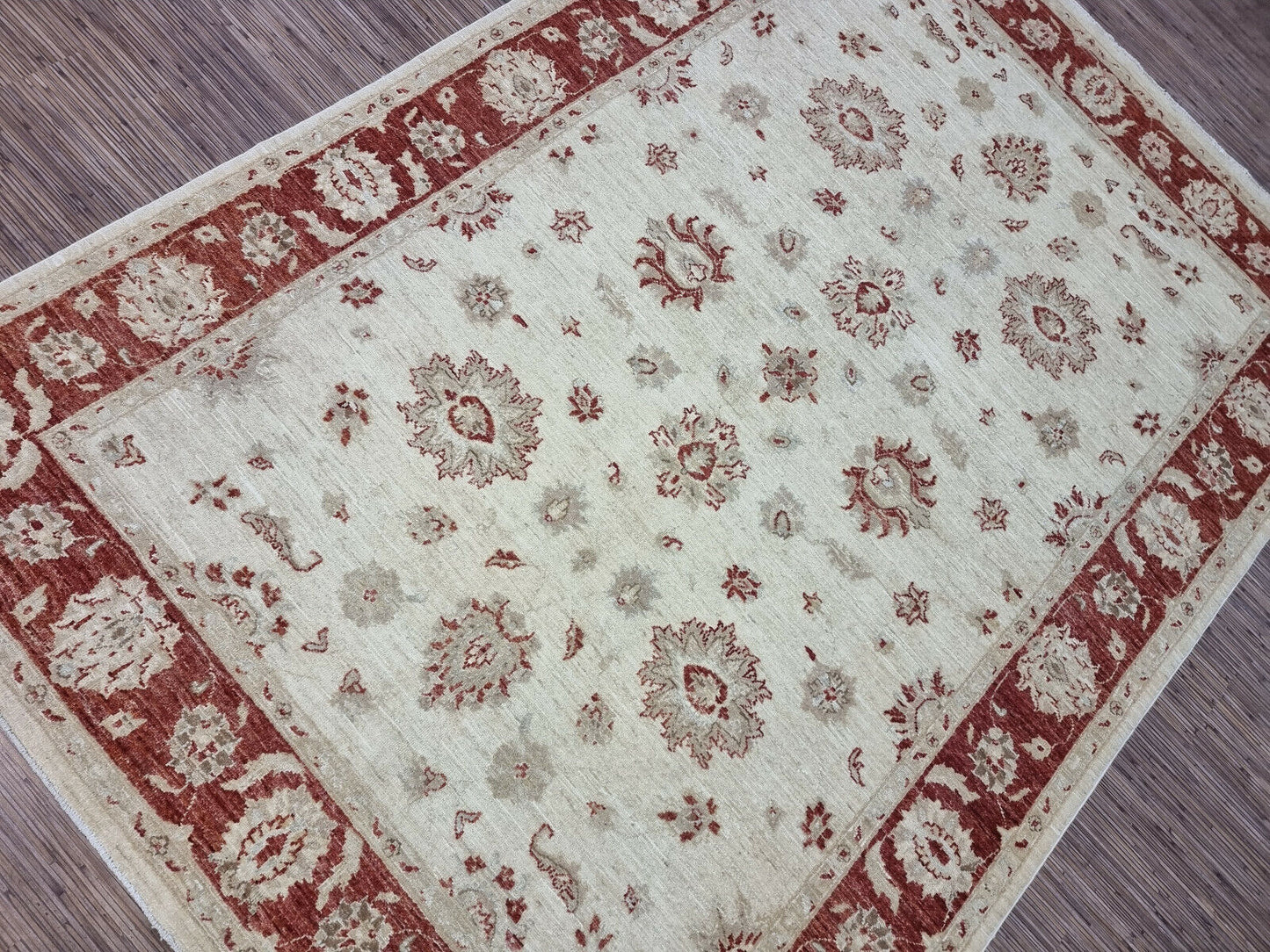Hand-knotted Afghan wool rug with intricate Ziegler patterns