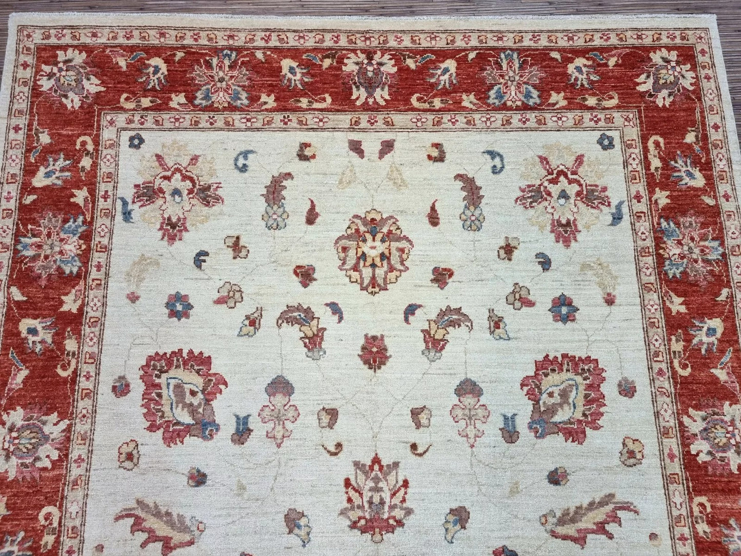 Traditional floral rug with scrolling vines