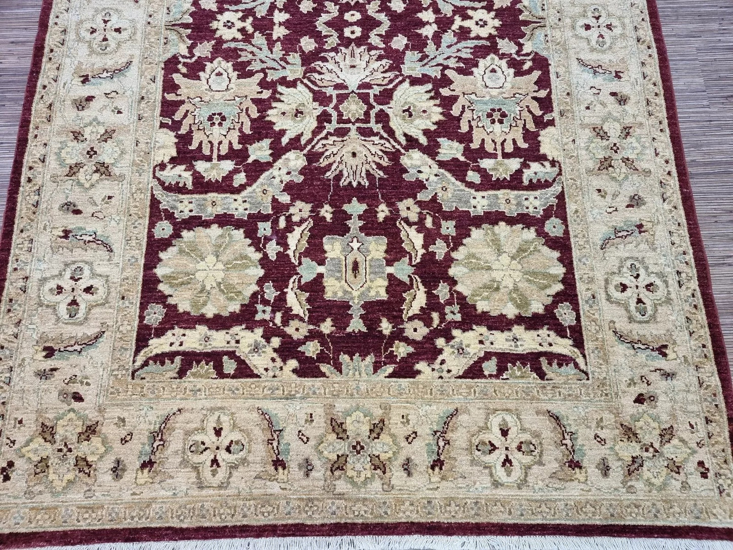 Handmade beige and red traditional rug