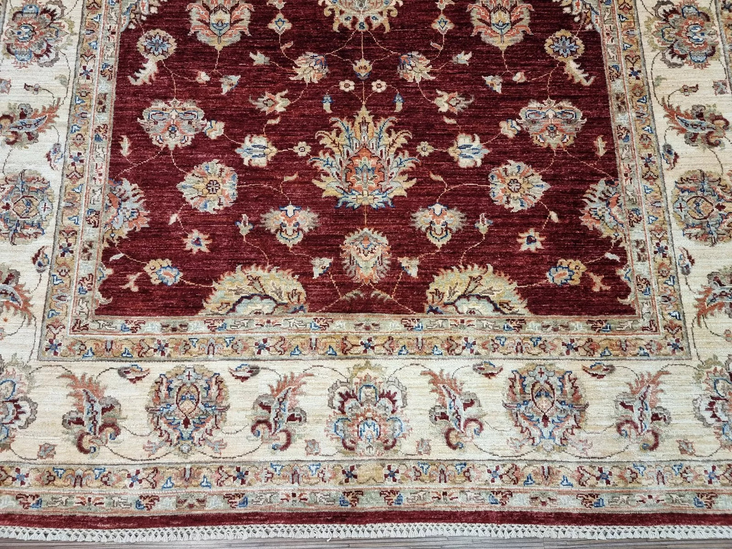 Wool floral rug in Sultanabad style from Afghanistan