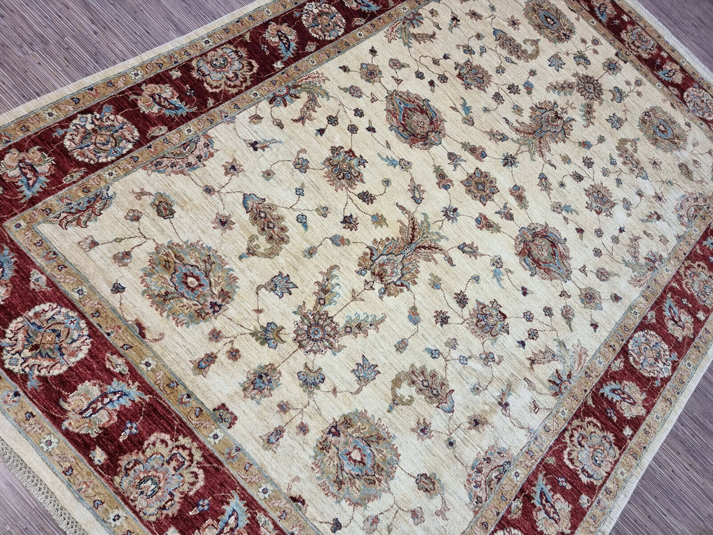 Large Zigler rug in warm red and beige tones