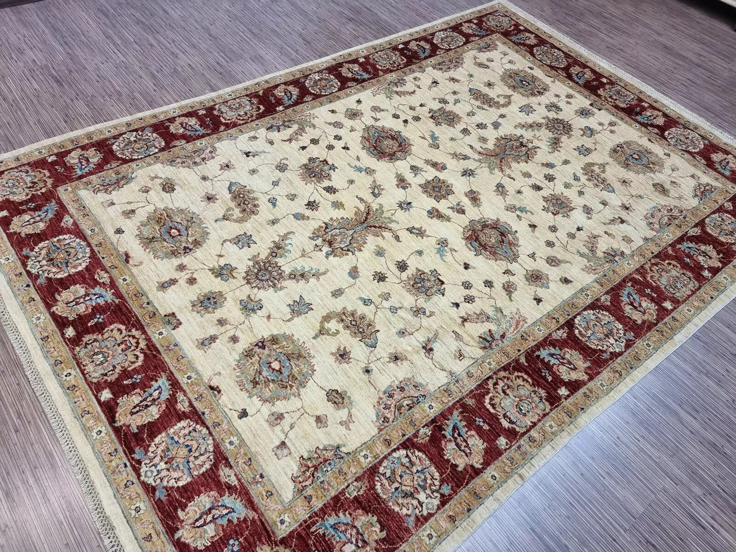 Interior setup with large floral Afghan carpet