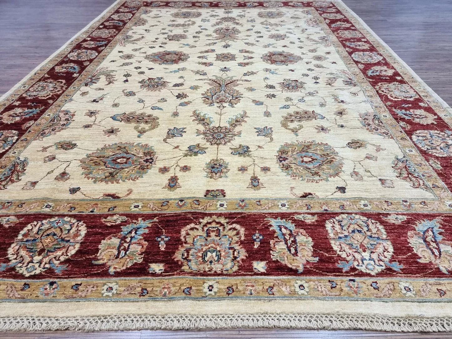 Red and ivory floral carpet from Afghanistan