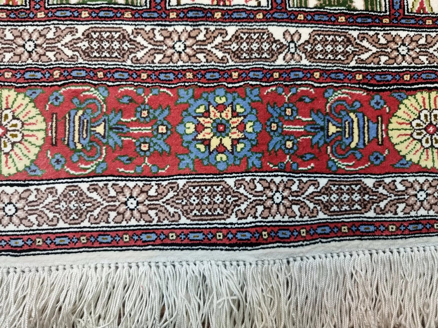 Small Qom rug with luminous silk pattern