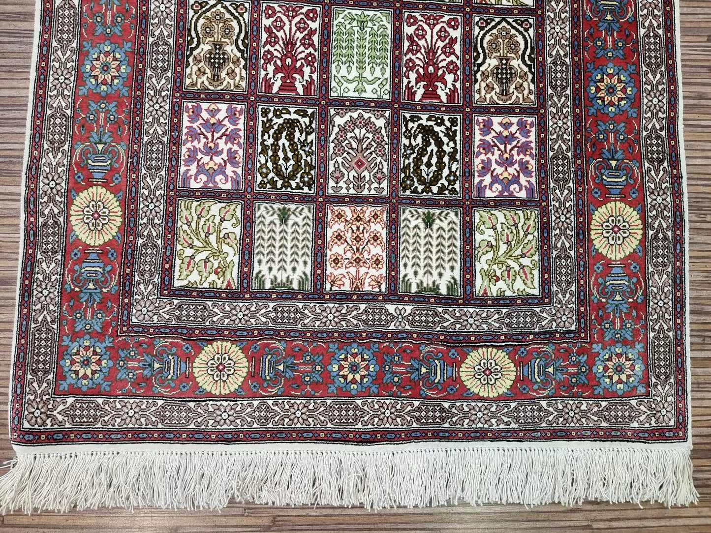 Handmade 1980s Qom silk carpet with detailed design