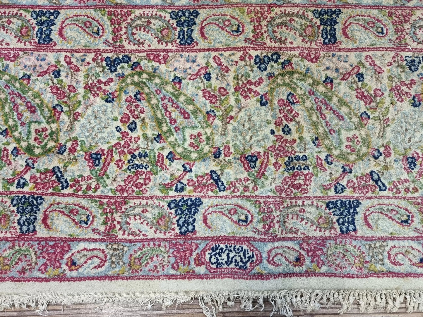 Antique Persian Kerman rug in good condition for its age (circa 90 years old), hand-knotted with premium wool, ideal for collectors seeking authentic Persian weaving.