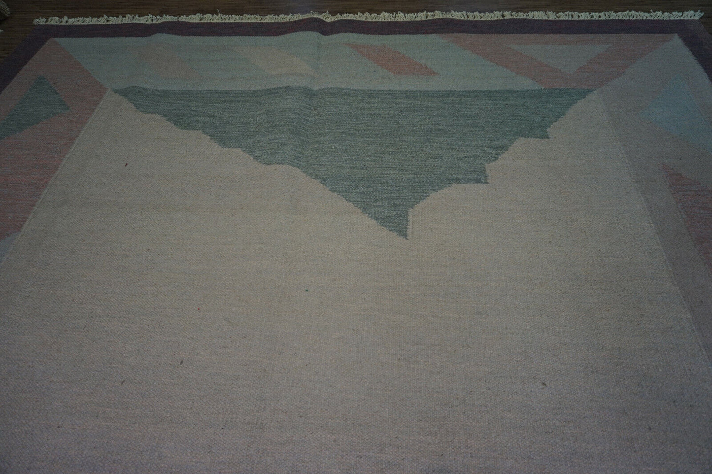 Spruce up your living space with this statement-making Vintage Indian Dhurrie Kilim Rug.
