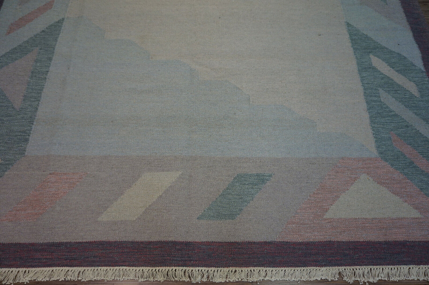 Create a welcoming atmosphere with this Light and Airy Pastel Geometric Indian Kilim Rug.