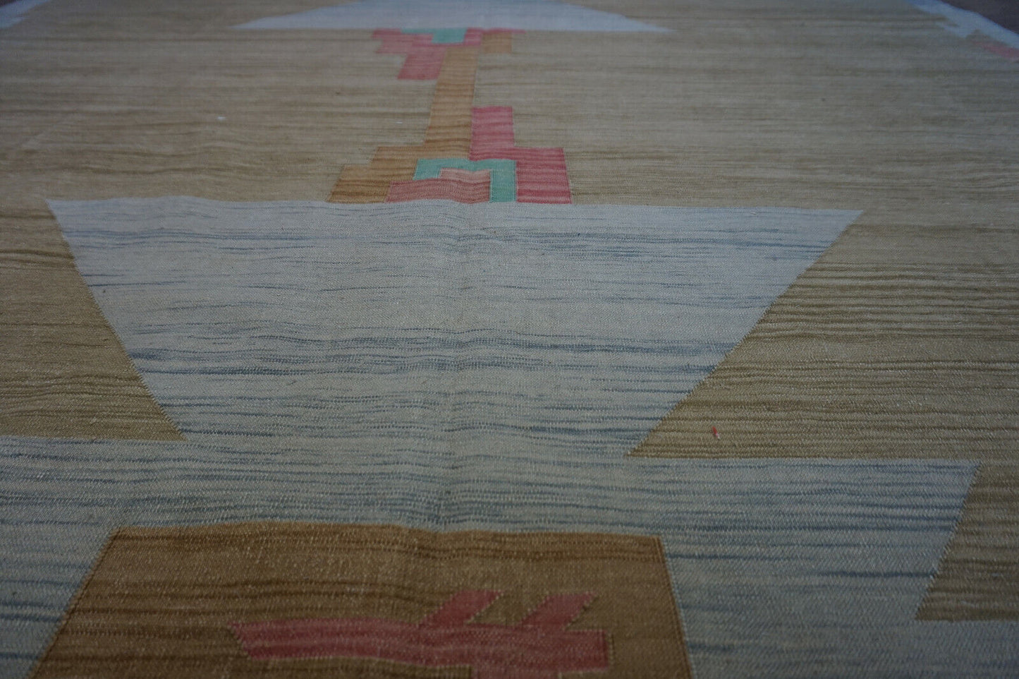 Experience the artistry of Indian textiles: Vintage Kilim Rug (6.5' x 8.2') in classic brown & pink.