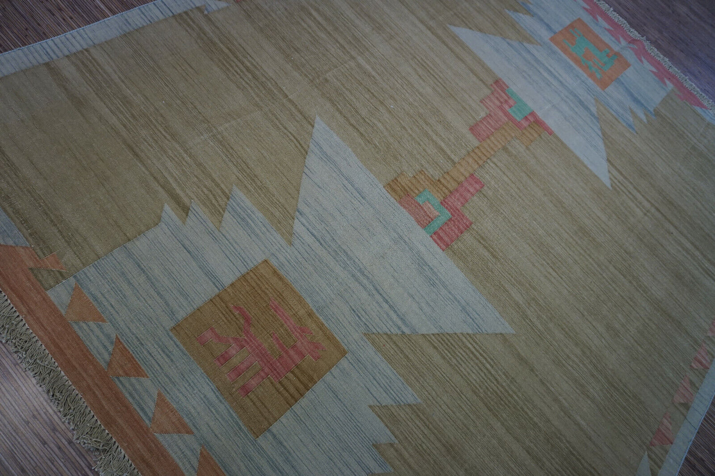 Handwoven in India, this Vintage Dhurrie Kilim Rug (6.5' x 8.2') offers timeless style and quality.