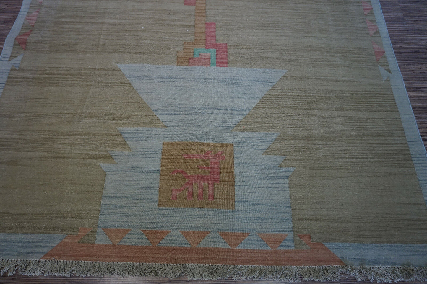 Unique and captivating: Handwoven Indian Dhurrie Kilim Rug boasts a 1970s geometric design (brown & pink).