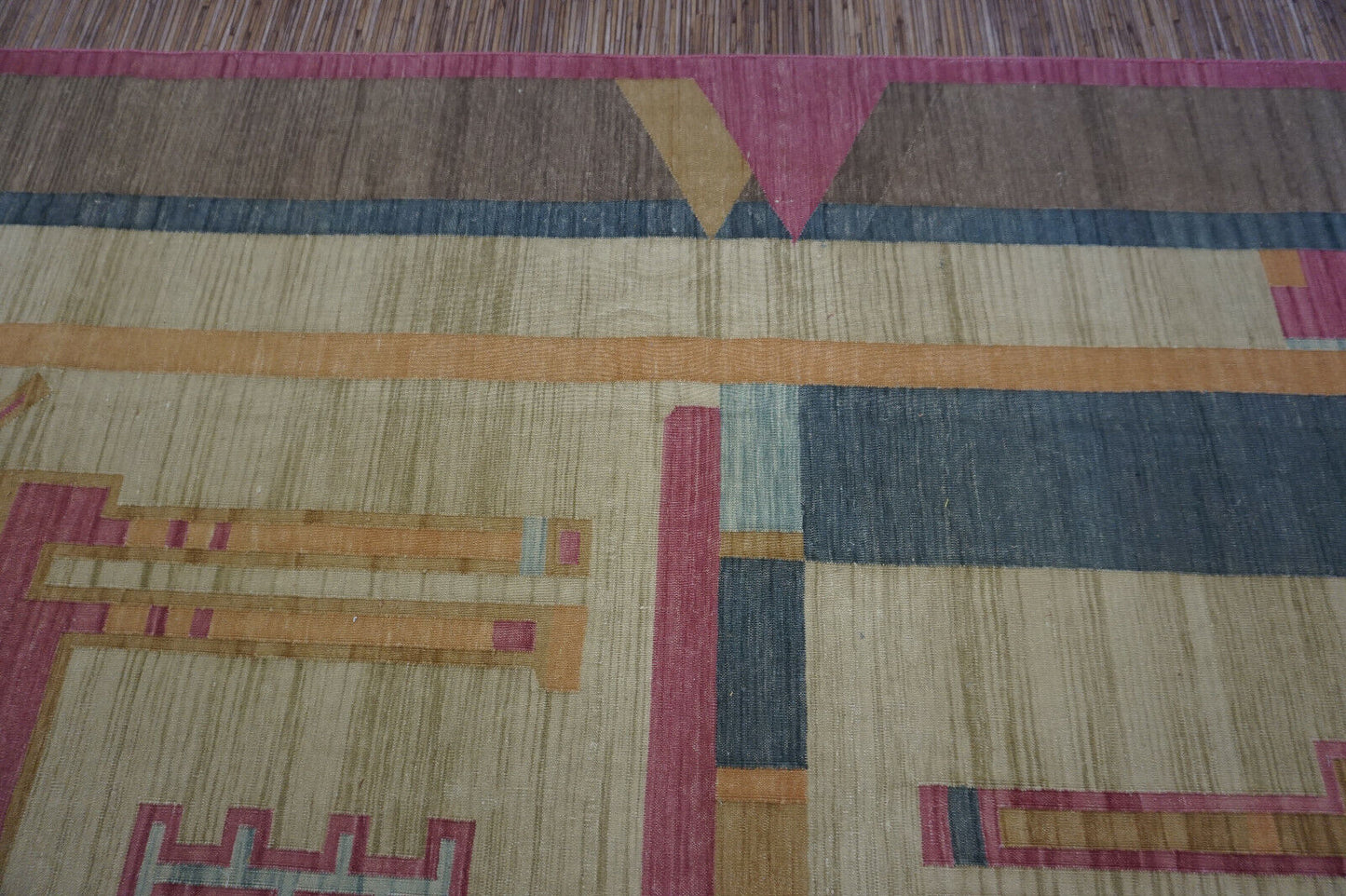 Unique and captivating: Handwoven Indian Kilim Rug boasts a playful camel design on a sunny yellow background.