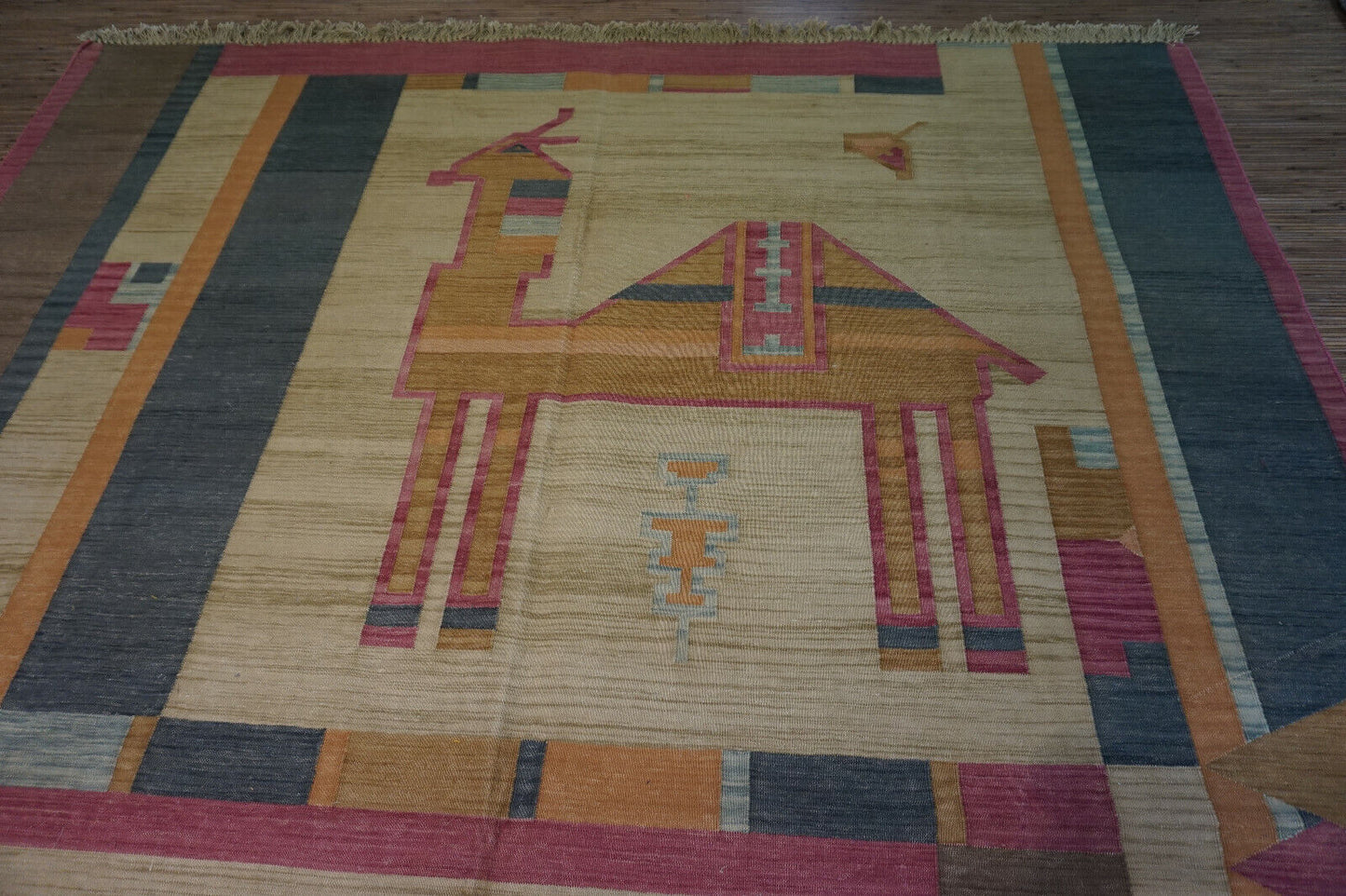 Brighten your space: Vintage Yellow Kilim Rug with intricate camel figures, crafted in India (6.3' x 8.3').