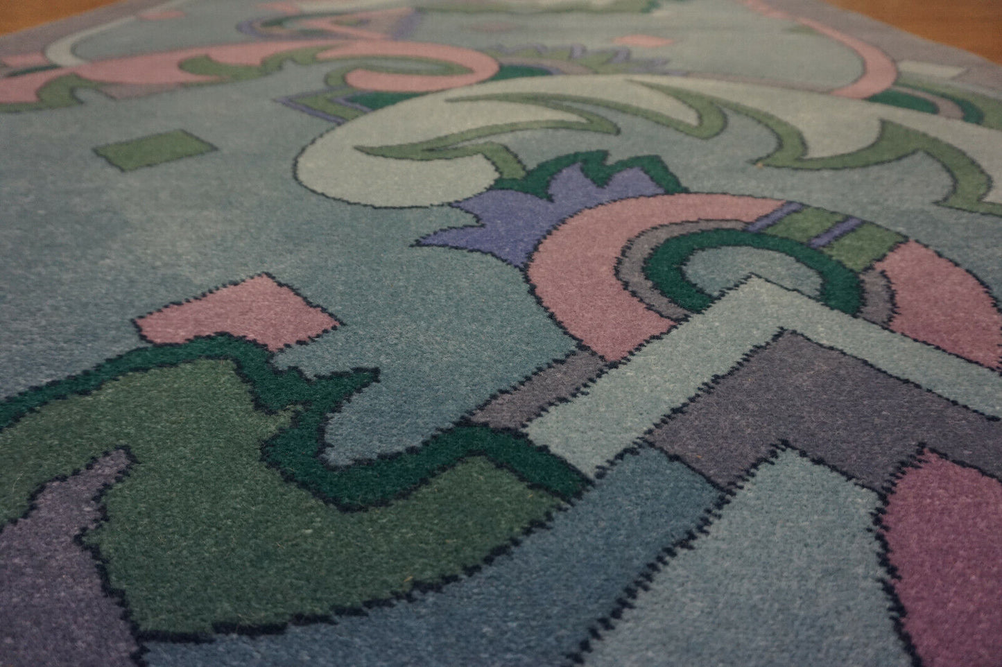 "Impress your guests with the timeless elegance of the Dutch Geometric Vintage Rug