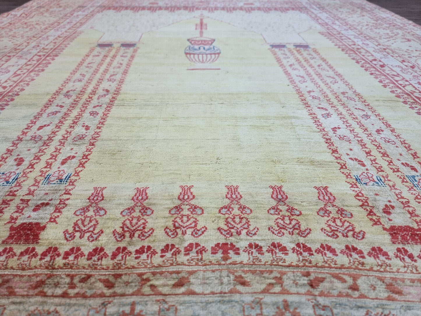 Antique Silk Tabriz Prayer Rug (1880s): Invest in a piece of history with this captivating Tabriz prayer rug. (Close-up of section in a styled setting)