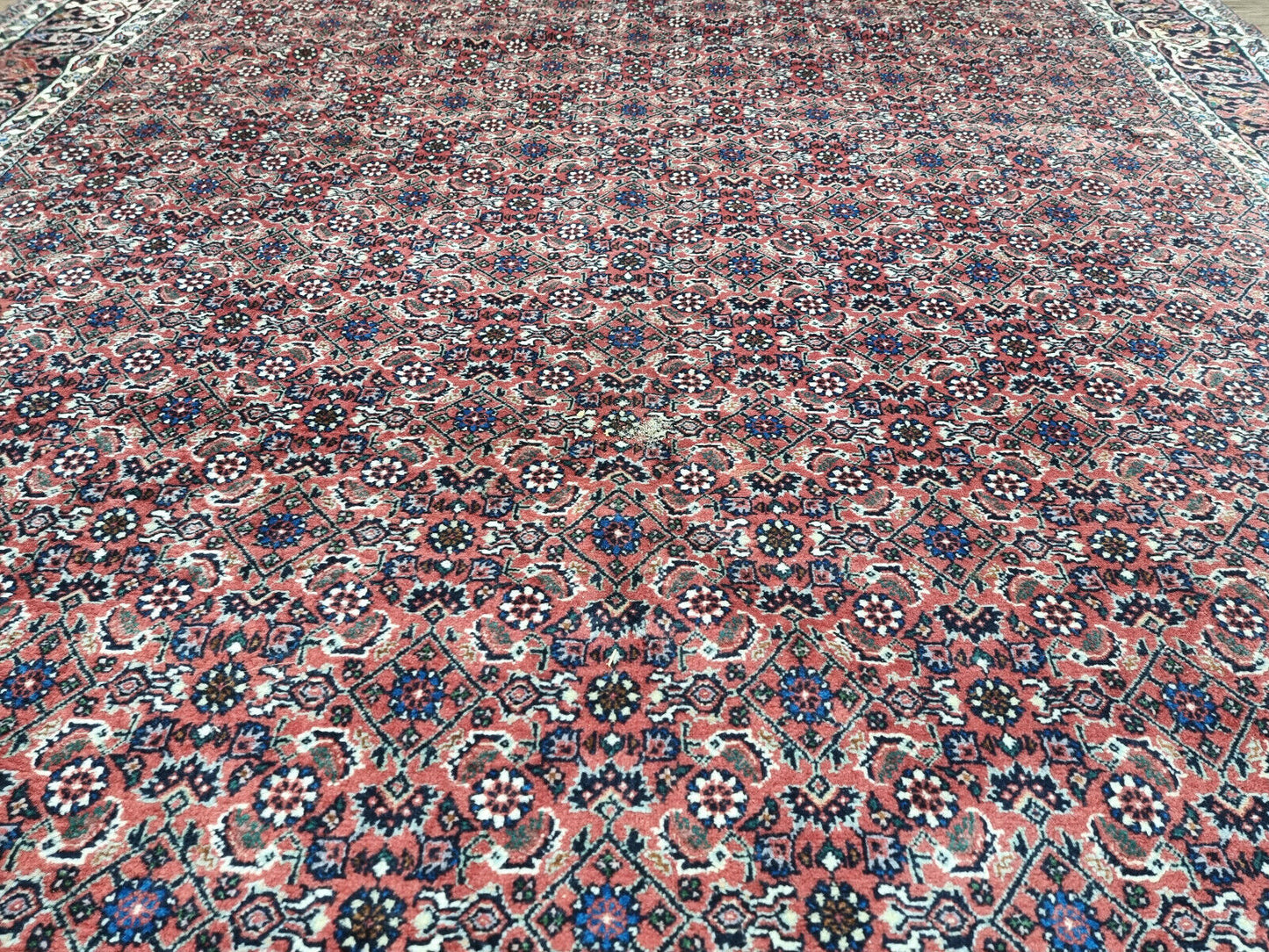 Dining Room Rug: A Luxurious Foundation: Elevate your dining space with the timeless elegance of this handwoven Persian Bidjar rug, perfect for larger areas.
