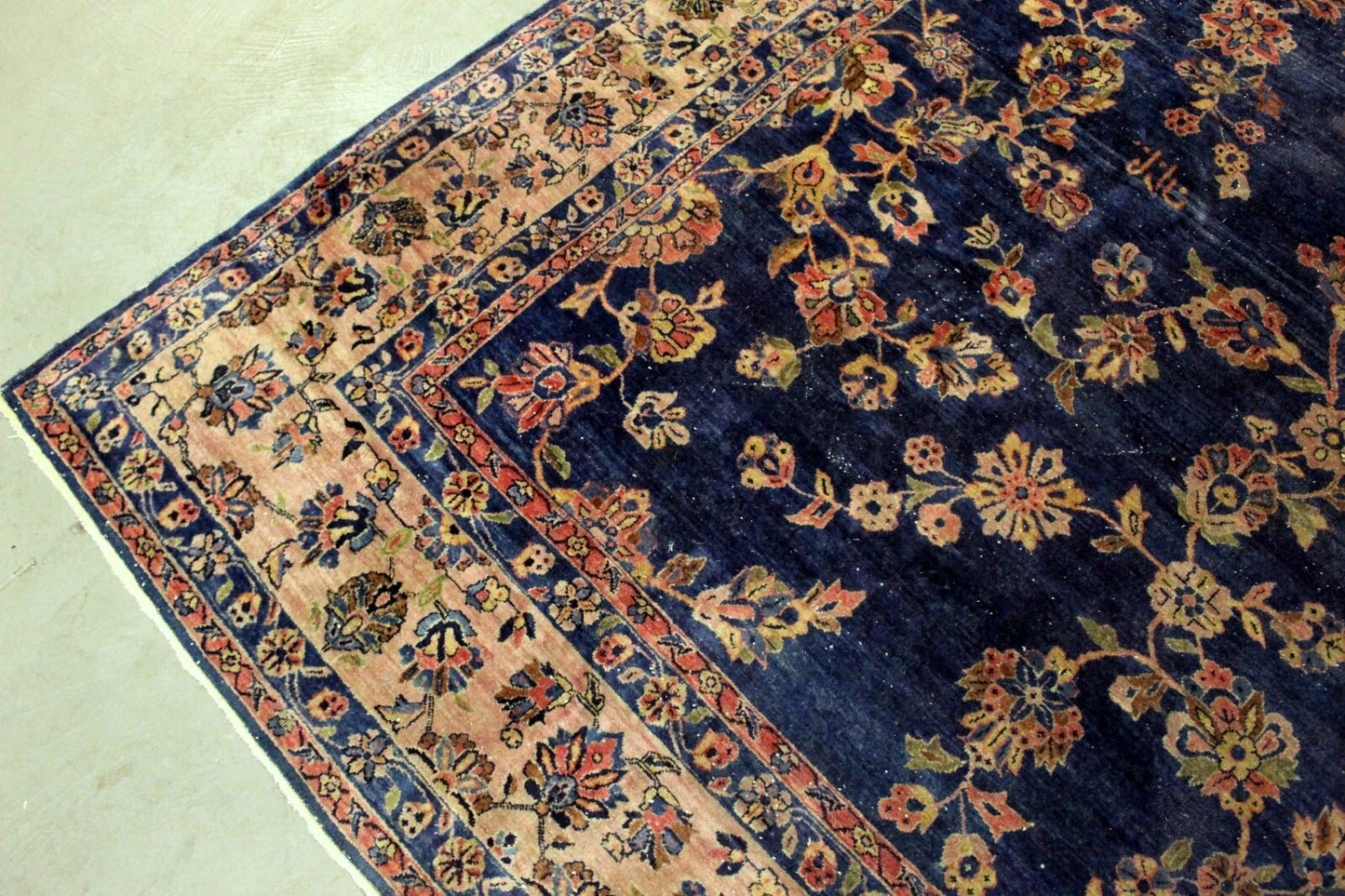 Collector’s Persian Sarouk rug with refined floral arrangements