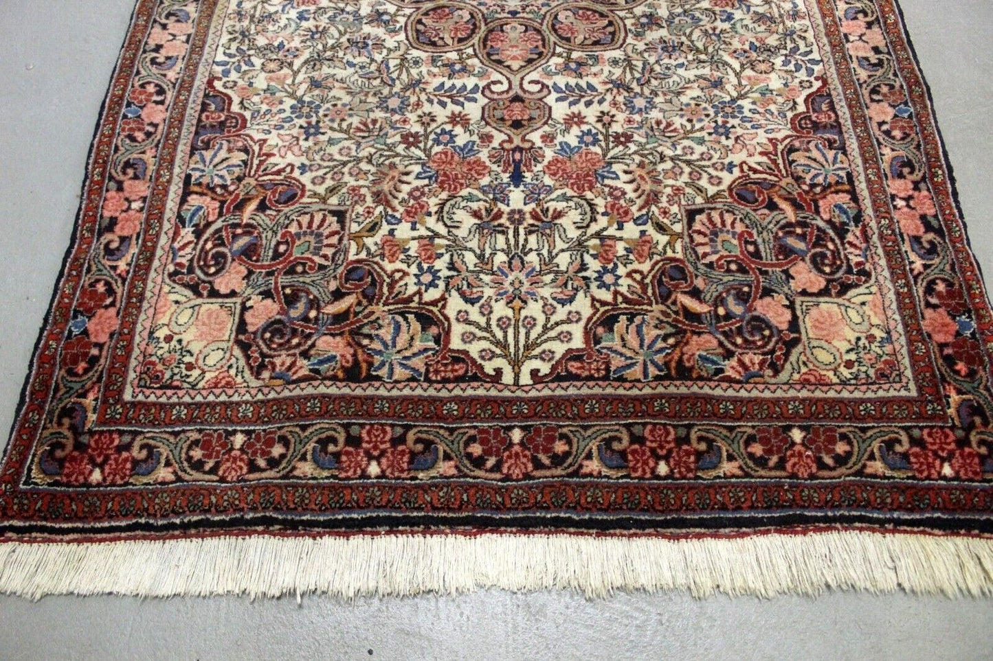 Persian Bidjar rug with symmetrical medallion and geometric border