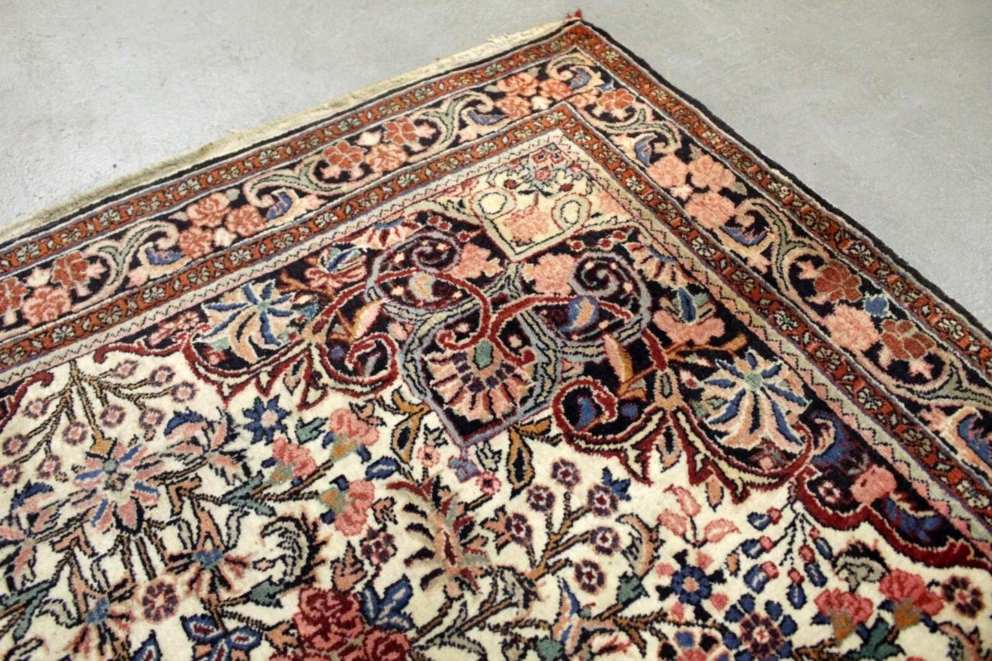 Persian Bidjar rug displaying a vibrant interplay of colors and shapes
