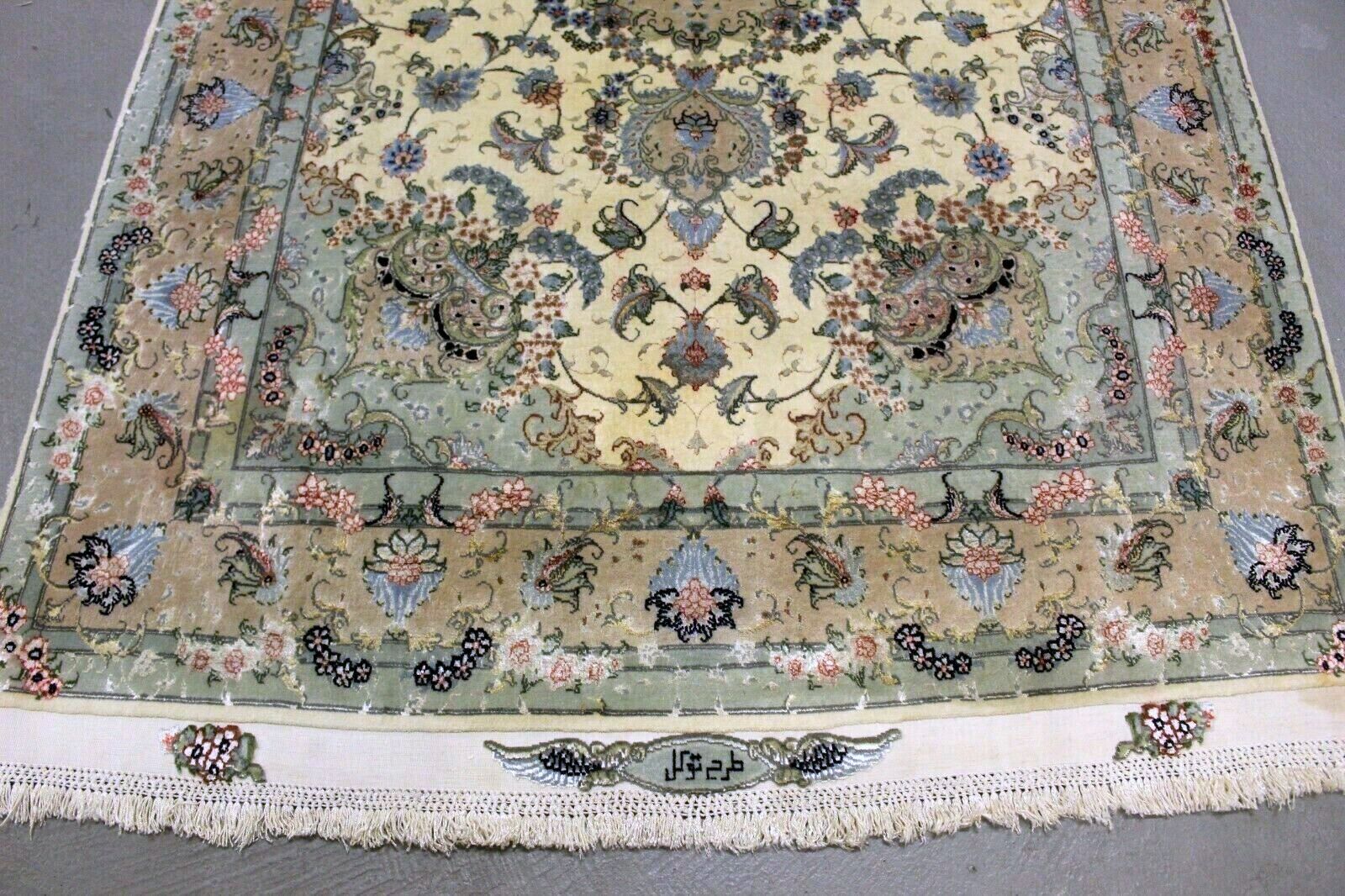Rich and Diverse Color Palette Including Muted Greens, Creams, Blues, and Touches of Reds on Vintage Tabriz Rug - 1970s