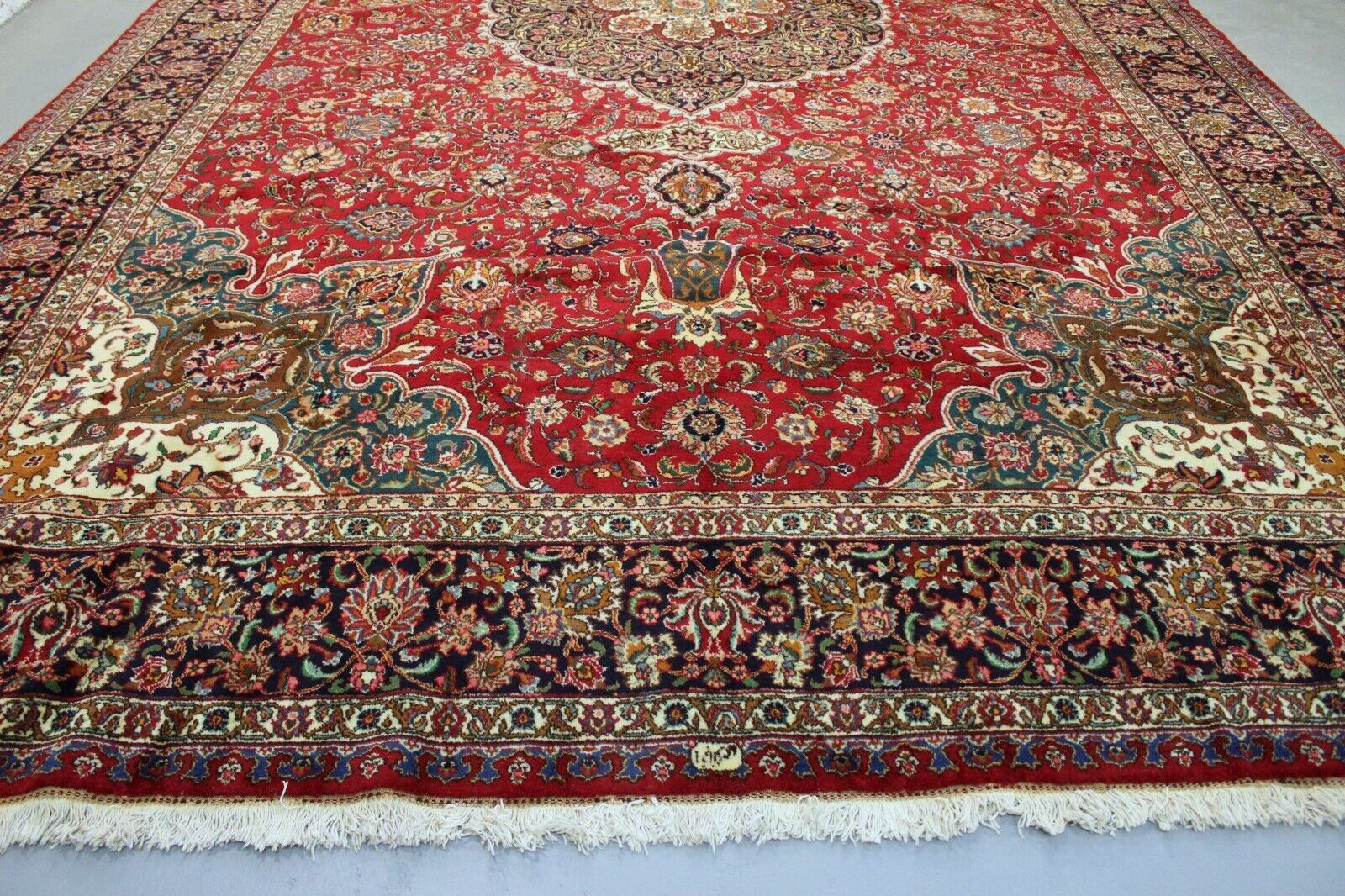 Intricate Floral and Geometric Motifs Meticulously Woven on Vintage Persian Tabriz Oversize Rug - 1960s