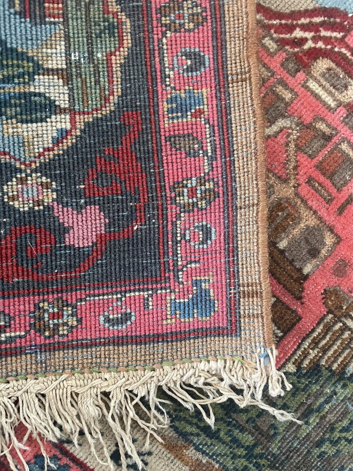 Back side of the Handmade Antique Persian Kashan Collectible Rug - Underside view revealing the rug's construction and material.