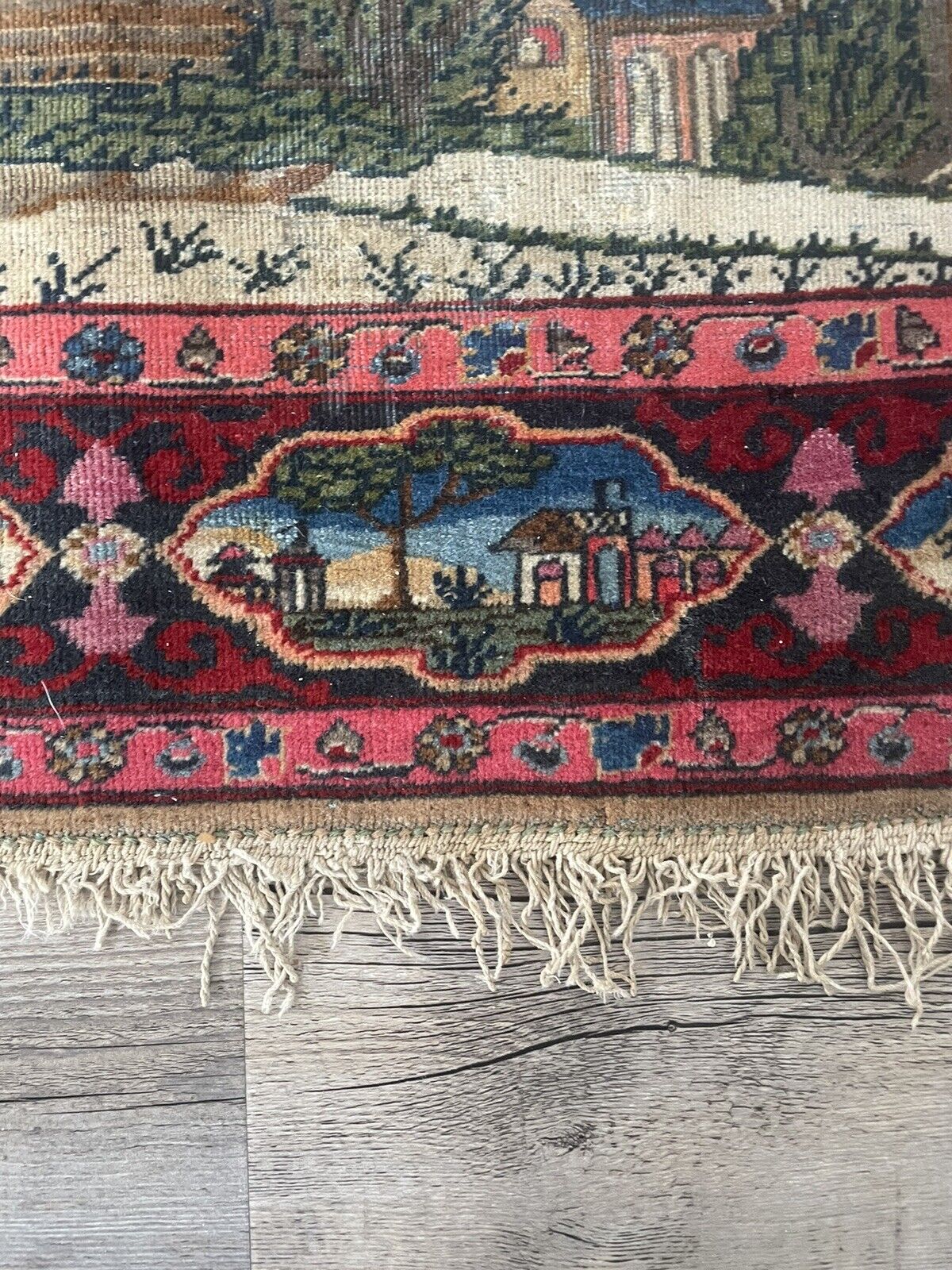 Close-up of color palette on Handmade Antique Persian Kashan Collectible Rug - Detailed view showcasing the rich color palette of the rug, including red, blue, and cream tones.