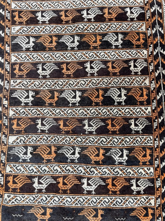 Repeating medallions on deep red field