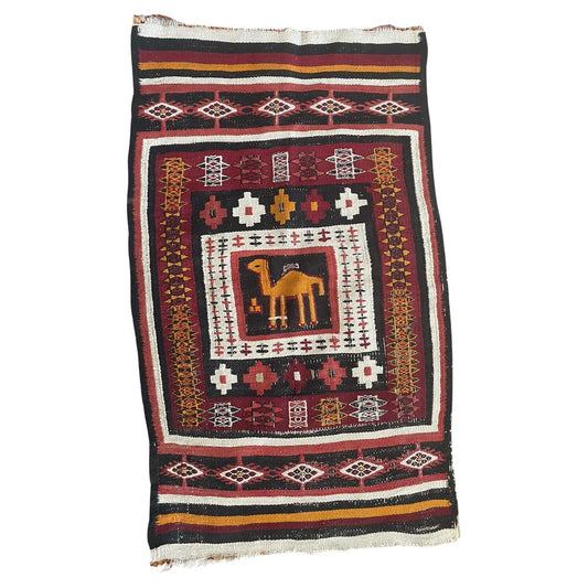 Handmade Antique Moroccan Berber Kilim Rug - 1920s - Rectangular rug featuring intricate Berber motifs and camel design.