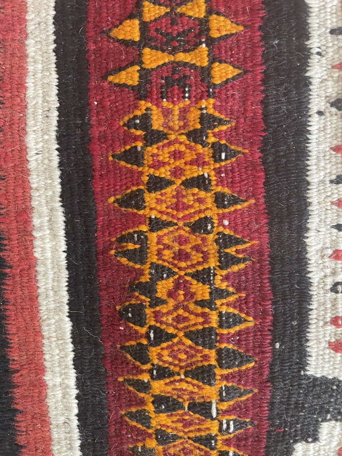 Close-up of authenticity on Handmade Antique Moroccan Berber Kilim Rug - Detailed view highlighting the rug's authenticity as a collectible piece cherished for its historical significance.