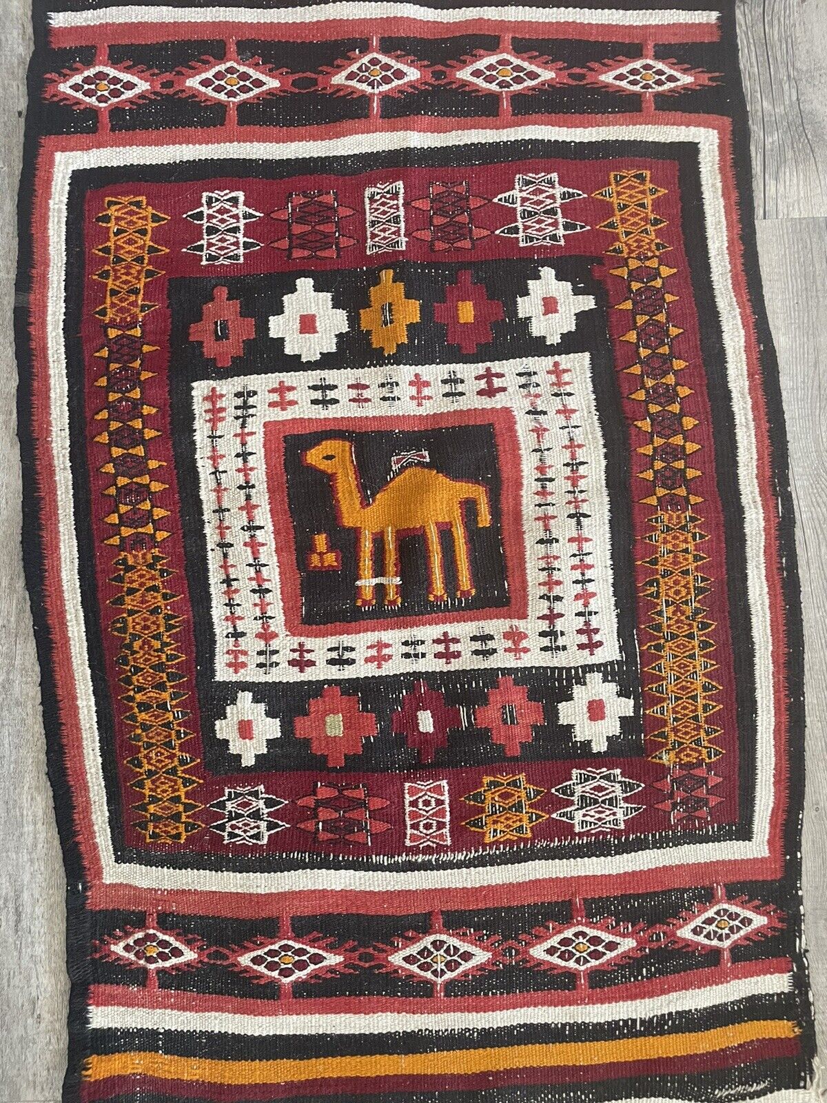 Close-up of historical significance on Handmade Antique Moroccan Berber Kilim Rug - Detailed view emphasizing the rug's historical significance as a rare gem from the 1920s, carrying the spirit of the desert and the Berber people.